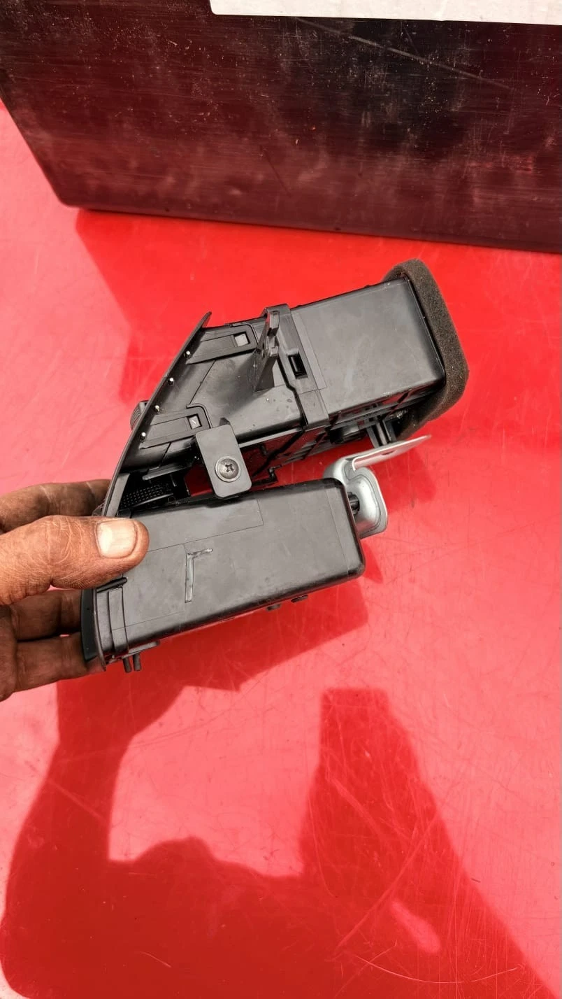 Hyundai Coupe passenger dashboard air vent rear duct and mounting bracket