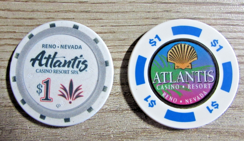 TWO ONE-DOLLAR CASINO CHIPS FROM ATLANTIS CASINO RESORT SPA IN RENO