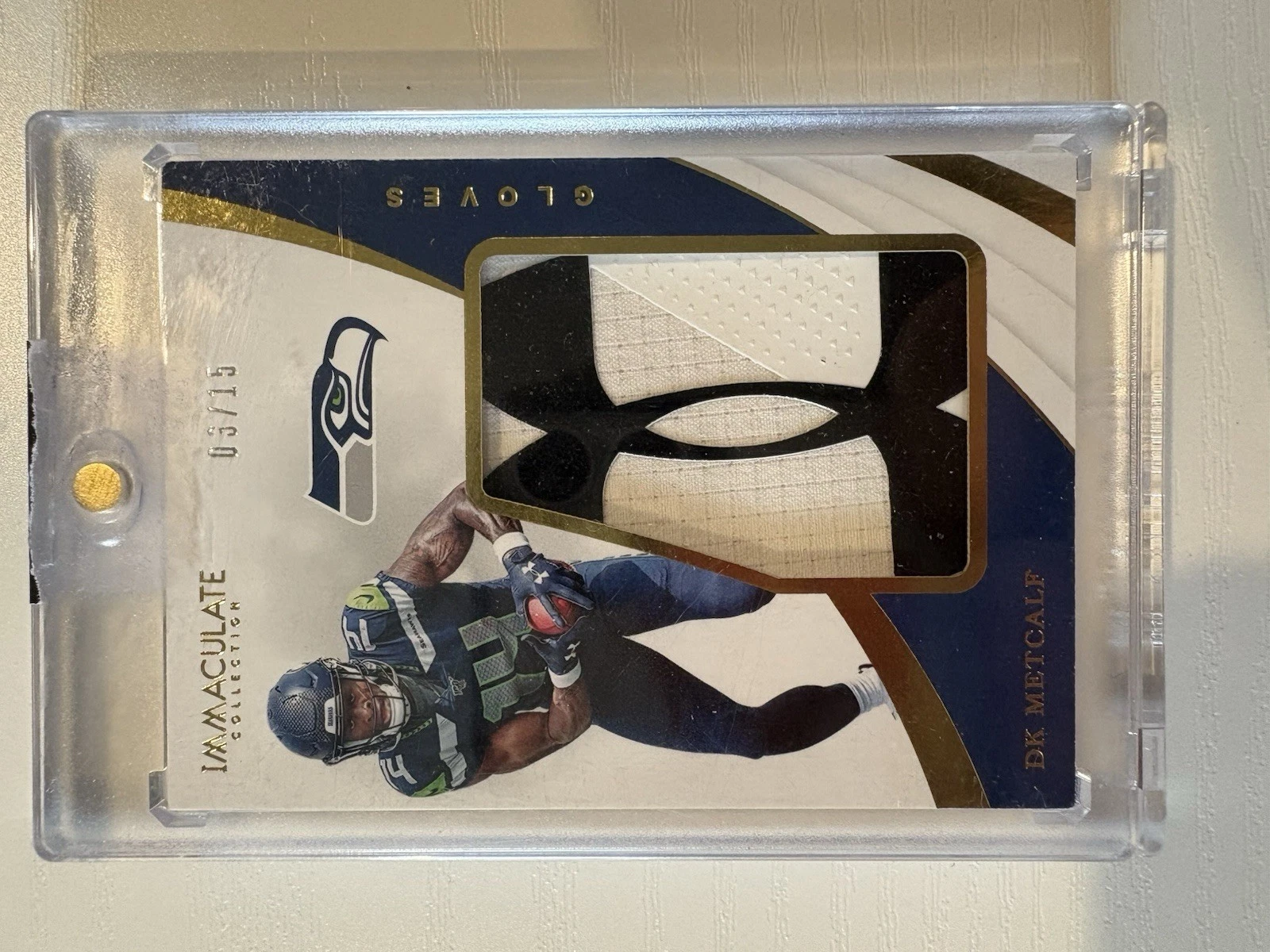 DK Metcalf Panini Immaculate Collection Immaculate Gloves #IG13 Base