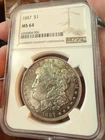 1887 P Morgan Silver Dollar NGC MS64 Coin (Some Green Toning On Obverse)