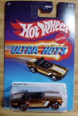 Hot Wheels Ultra Hots TRIUMPH TR6 Gold Diecast 1:64 NIB