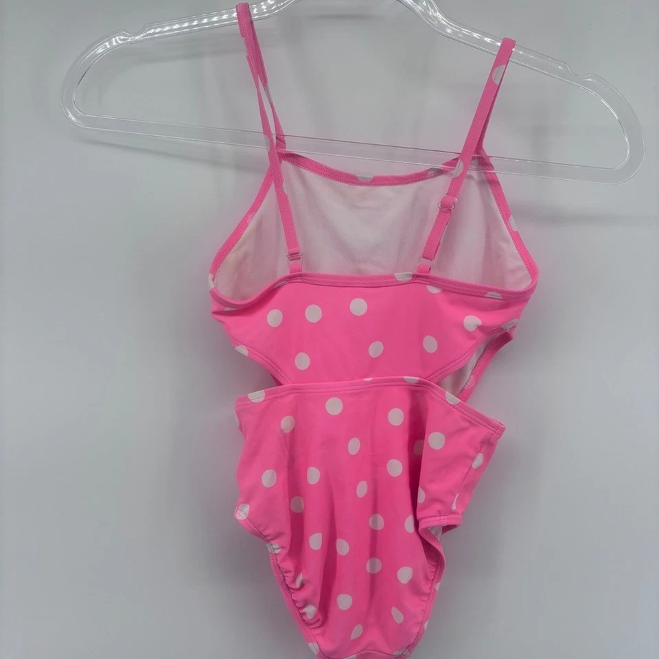 Lindo traje de baño rosa a lunares de una pieza para niñas Foto 2 de 4