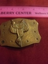 HORSE SADDLE ON WESTERN ENGRAVED GOLD TONE BELT BUCKLE
