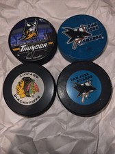 4 Hockey Pucks NHL San Jose Sharks Stockton Thunder Chicago Blackhawks Used Lot