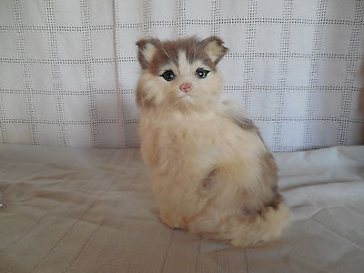 Rabbit fur sitting cat figure.