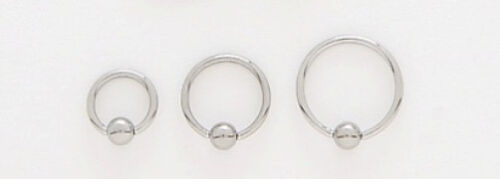 1 paire de 2 anneaux captifs en acier CBR 18g 5/16" cerceaux Tragus - Photo 1 sur 1
