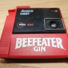Vintage Ansco Cadet 100 Disc Camera Beefeater Gin Advertisement