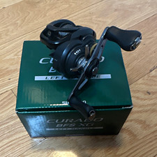 Shimano Curado BFS XG CU70XGL Left-Hand Baitc...