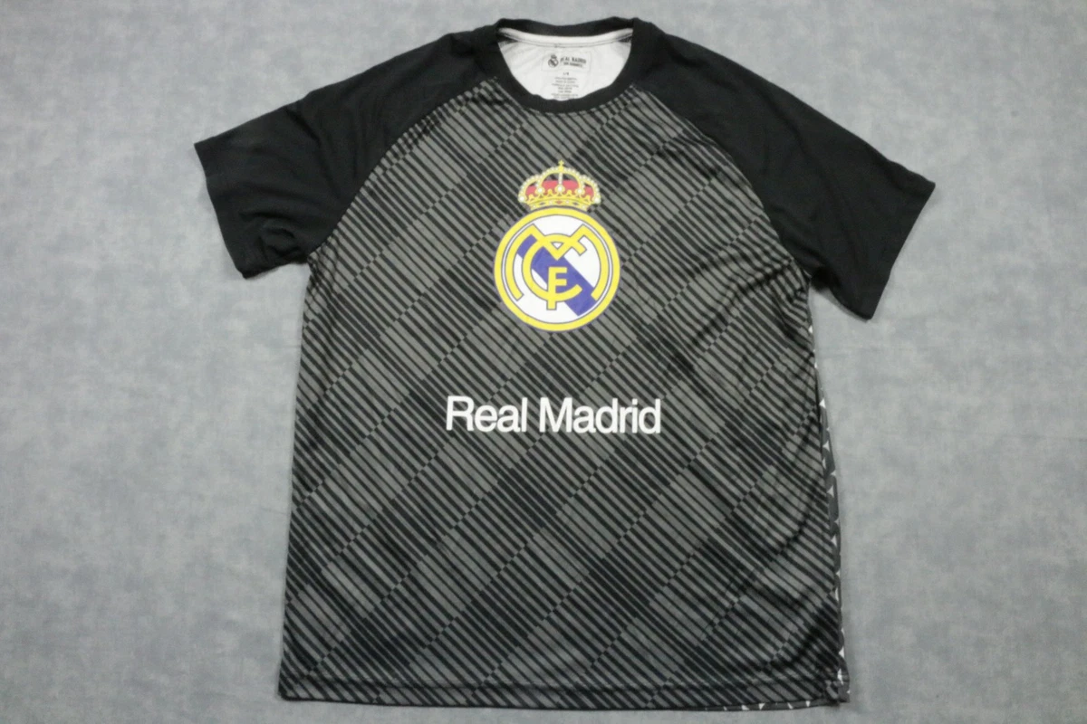 Preços baixos em Real Madrid Black International Club Camisas de