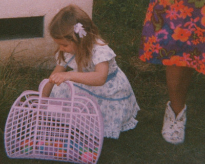 1980s Girl Finding Easter Eggs Happy Childhood Candid Portrait Toy Basket