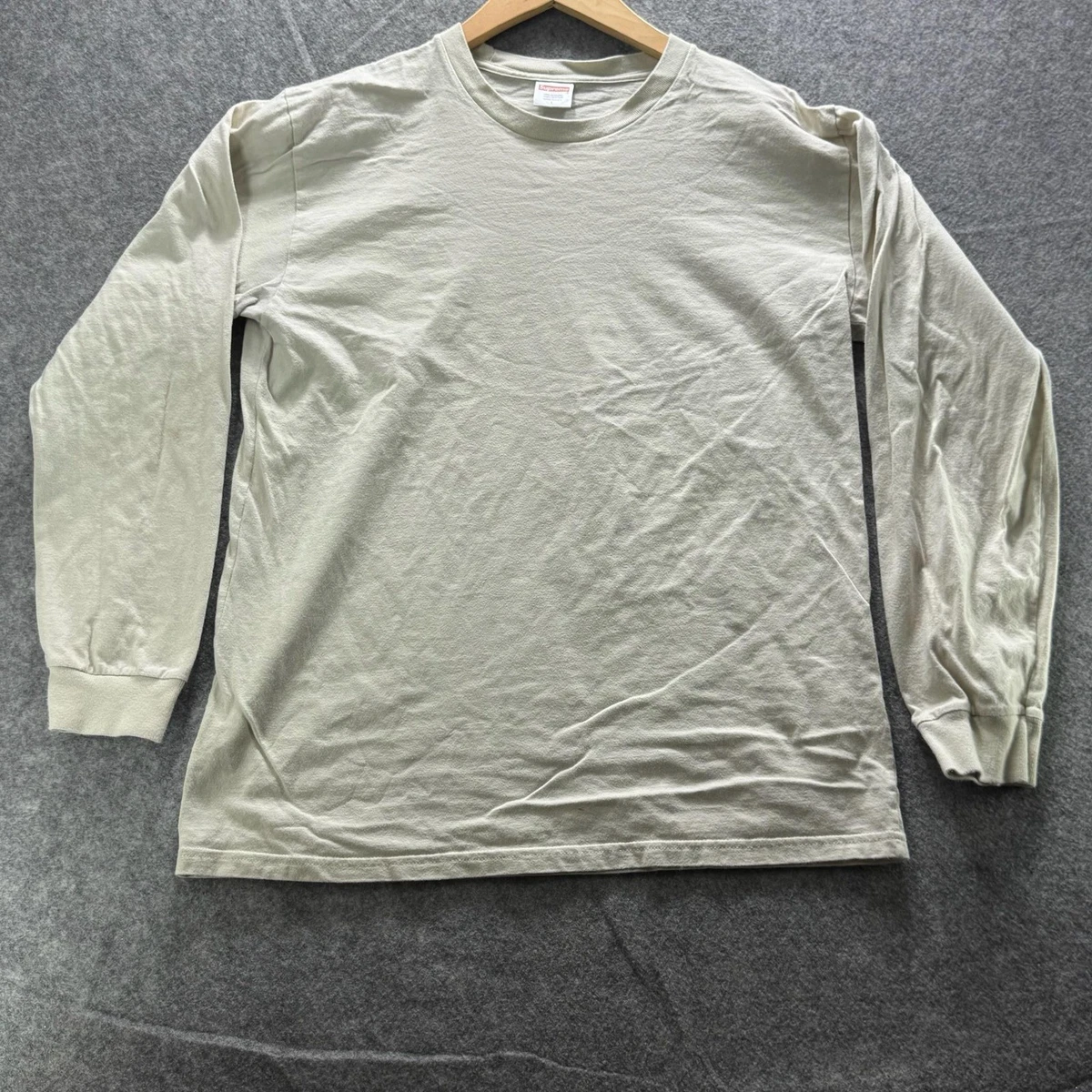 Preços baixos em Manga Longa de Algodão Supreme Camisetas Sólido