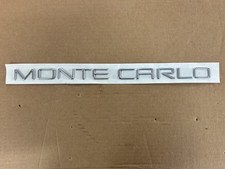 Nos Oem 1995-99 Chevrolet Monte Carlo Quarter Panel Chrome Emblem 10189884