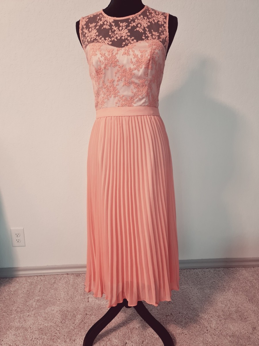 Warehouse pleated and lined orange dress. Size US 6