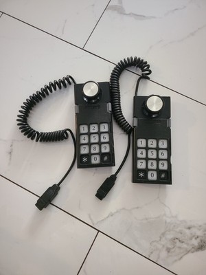 Pair of ColecoVision original controller with numeric keypad