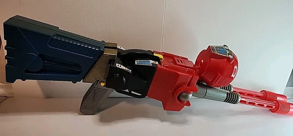 Figura transformadora de pistola robot pistola de juguete arco go bots 1984 de colección Foto 4 de 4