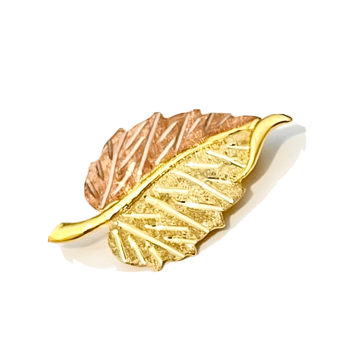 Gold leaf brooch deals