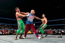 Kurt Angle breaks up a fight between Eddie Guerrero Chavo Guer- Wrestling Photo
