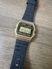 Casio F-91W Quartz Digital Gold Tone Resin Strap Watch Alarm Water Resistant
