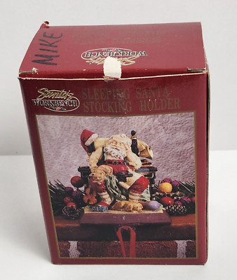 Santa's Workbench Christmas Hand Painted Stocking Holder Cast Iron Sleepy Santa