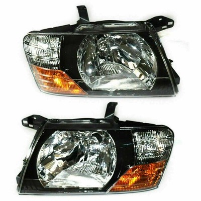 Pair Headlights (Left + Right) fits For Mitsubishi Pajero Montero 2000-2006