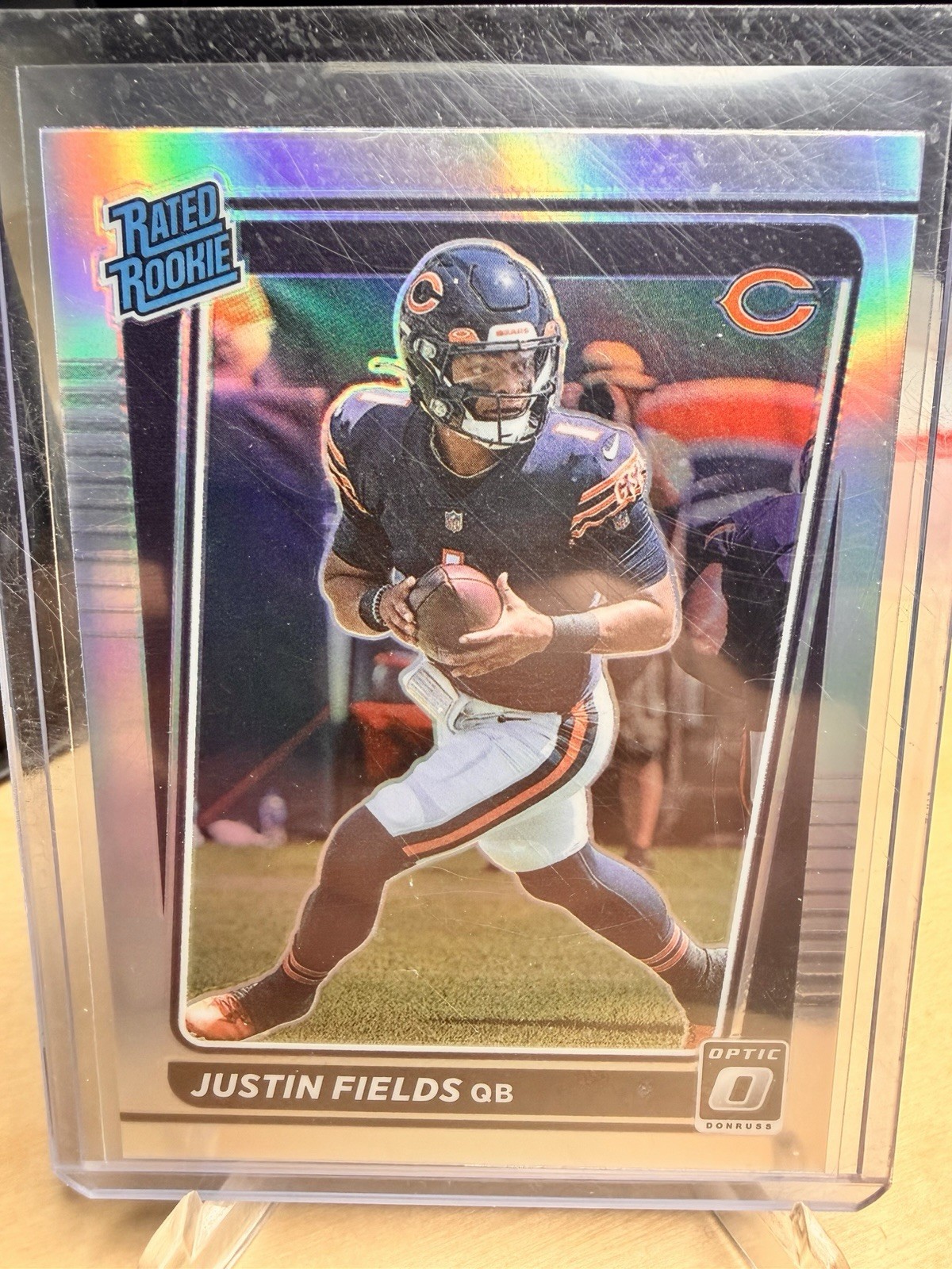 Justin Fields 2021 Optic #204 Holo Price Guide - Sports Card Investor