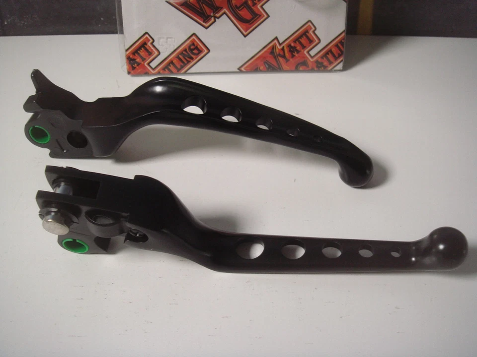 Palancas de mano Harley negras perforadas Softail Dyna Tour Sportster V-Twin 26-0984 X9 Foto 2 de 4