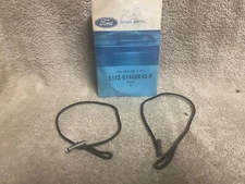 NOS FORD E1FZ-61466K43-B 1981-85 ESCORT MERCURY LYNX TRAY LIFTING CABLES PAIR