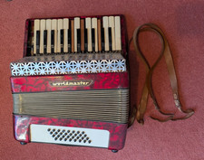 Worldmaster Accordian missing keys and very used, still works