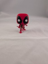 Funko Pop! Vinilo: Figura Marvel de vacaciones Deadpool #400 con bastones de caramelo