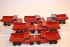 Seven (7) Vintage 1960's Matchbox Lesney Dodge Dumper Trucks #48