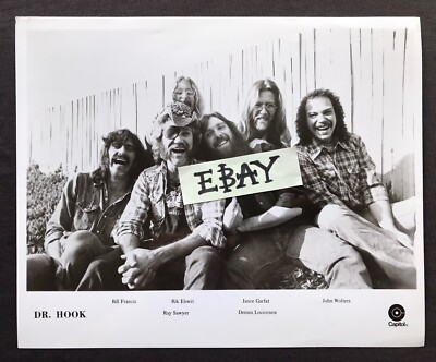 Ray Sawyer Dennis Locorriere vintage band photo Frequently Asked Questions