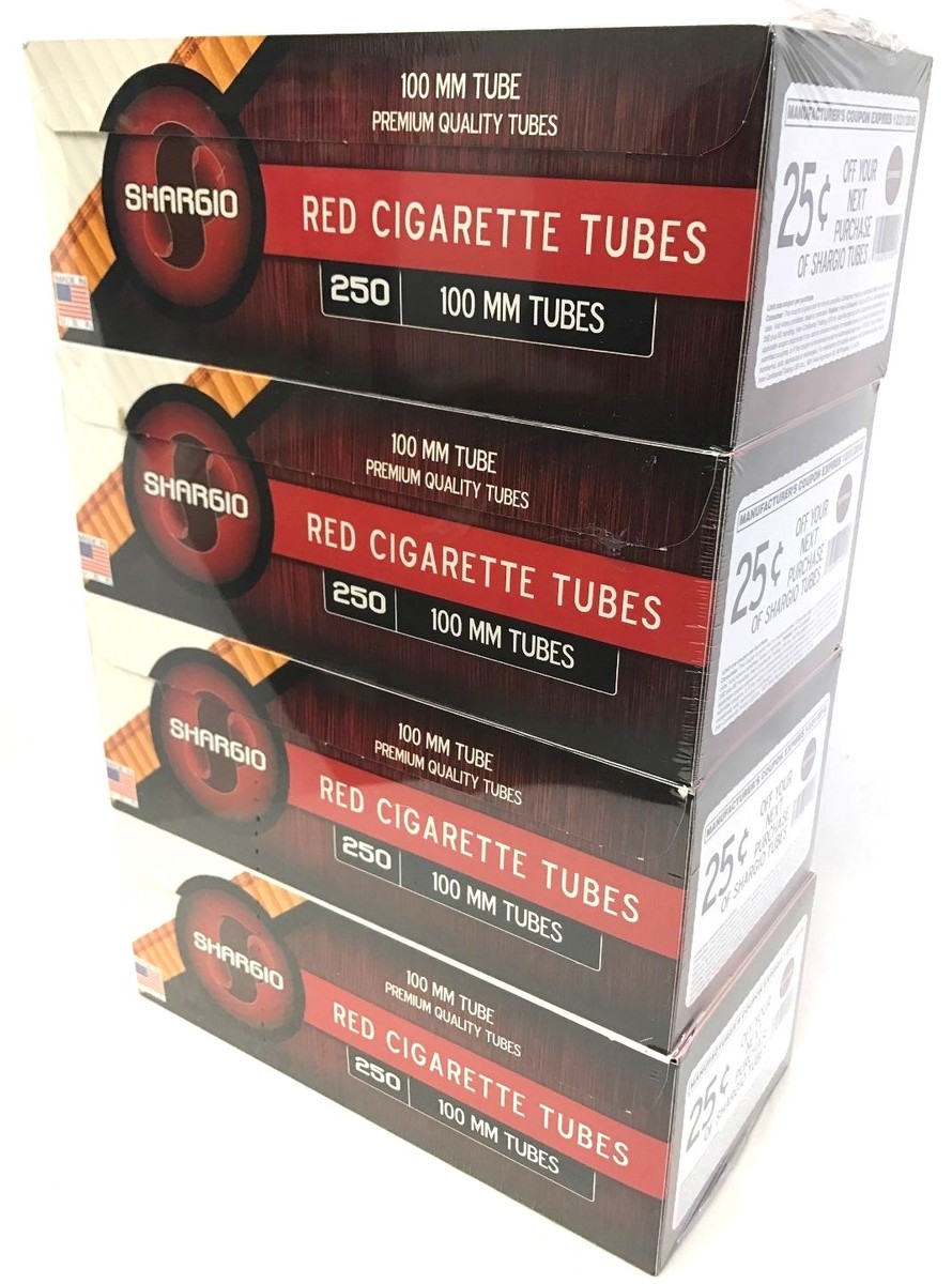 smoking a bunch of cigarettes at once Nervous man smoking a lot of cigarettes at once Stock Photo