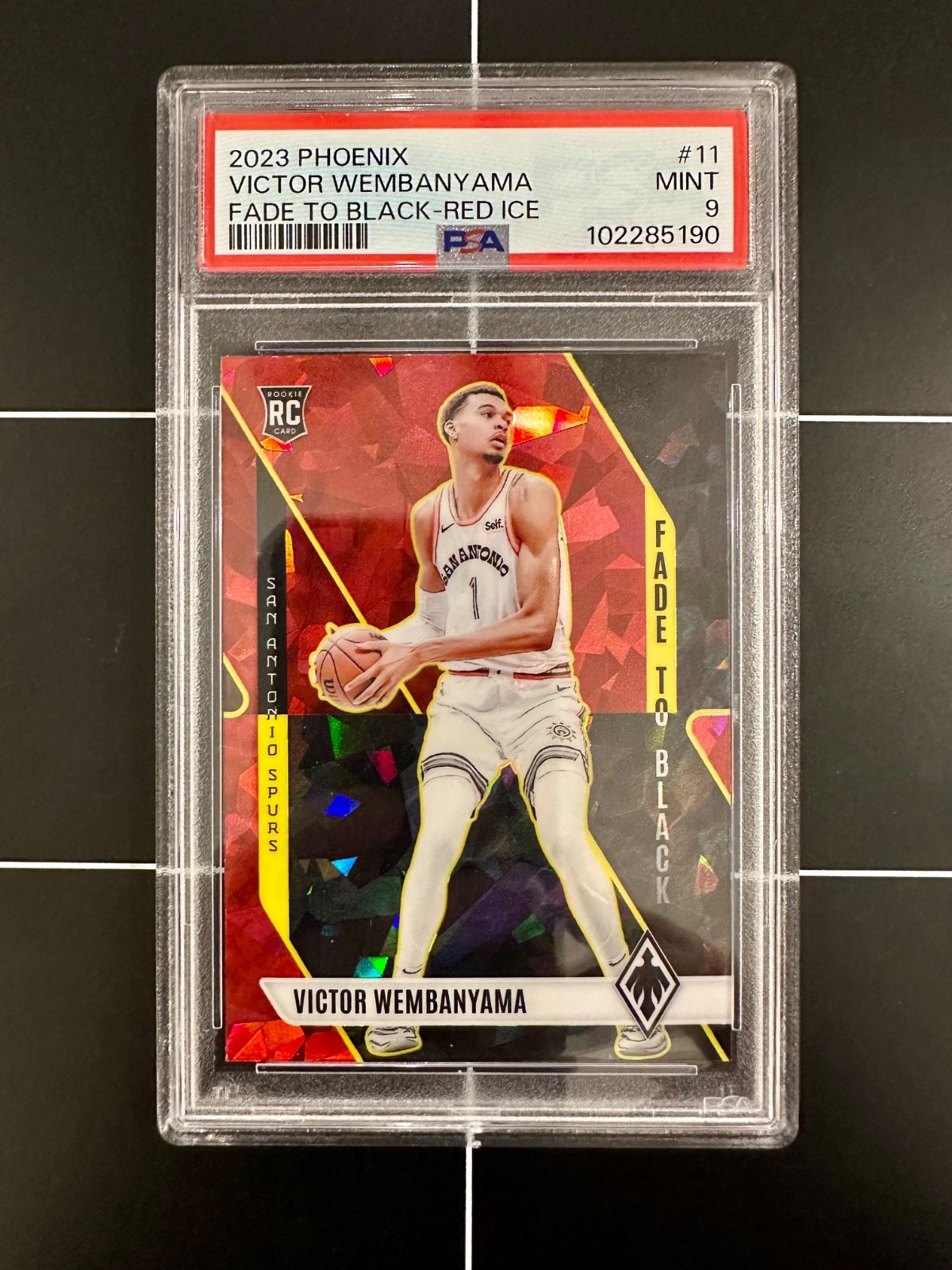 2023 Panini Phoenix Victor Wembanyama Fade to Black #11 RC Red Ice PSA 9