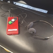 OEM New Old Stock Snapper Real Sound AM / FM Pocket Radio With Headphones