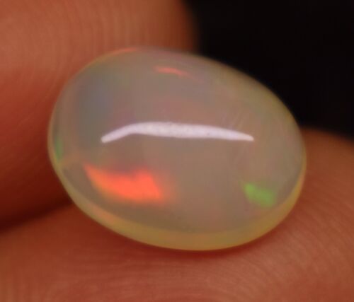 Cabochon ovale flashy opale feu 3,20 carats, taille 11,7 x 9 x 6,4 mm opale à fabriquer - Photo 1/3