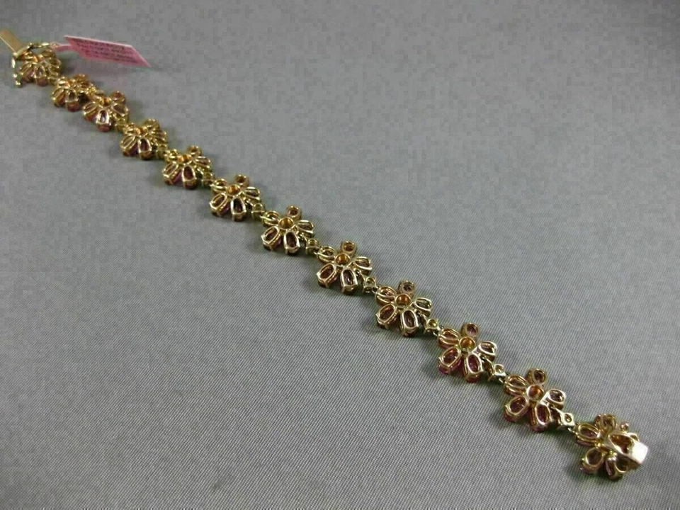 Brazalete racimo de tenis simulado rubí rosa ovalado de 15 quilates enchapado en oro amarillo plateado Foto 2 de 4