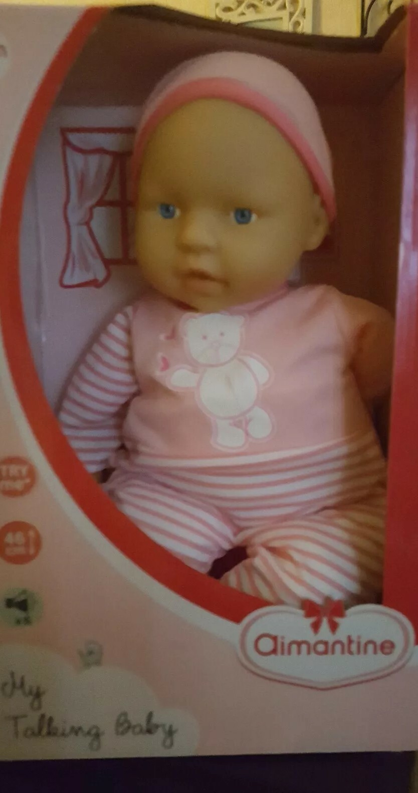 Bébé interactif 46 cm qui pleure et parle fourni avec son sac nomade rose