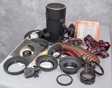 Lot of Camera Cases Hoods Filters Straps etc.