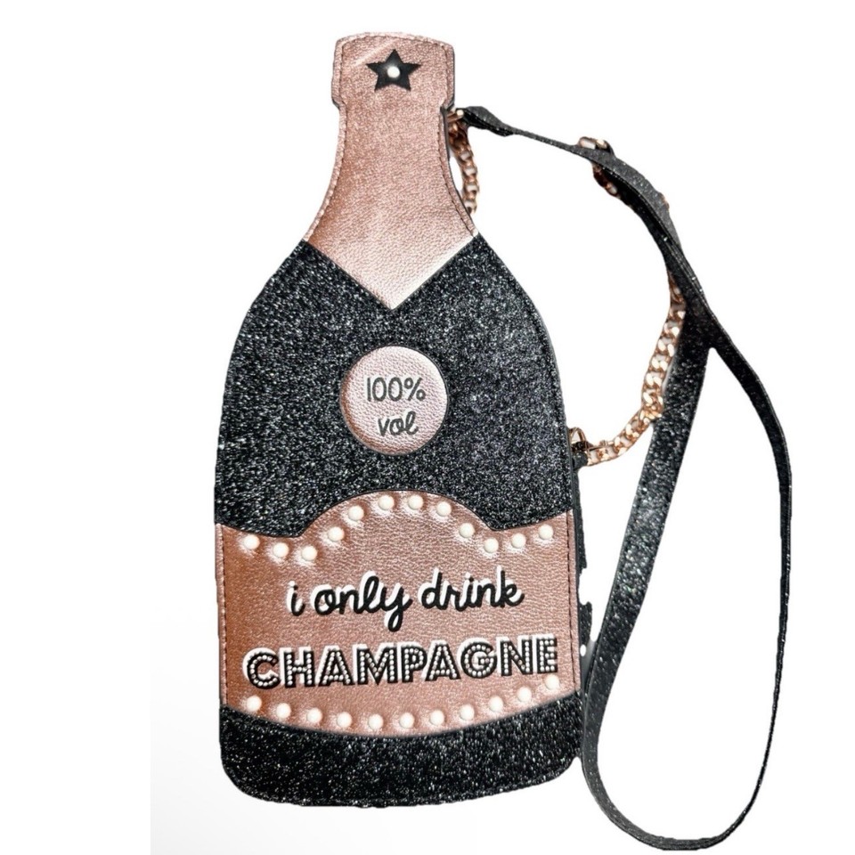 A glittery champagne bottle you wear as a purse — peak novelty accessory energy that doubles as a conversation starter at any party.