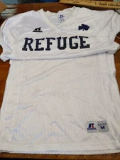 Russell Athletic FOOTBALL JERSEY size medium refuge shamrock cross on back 