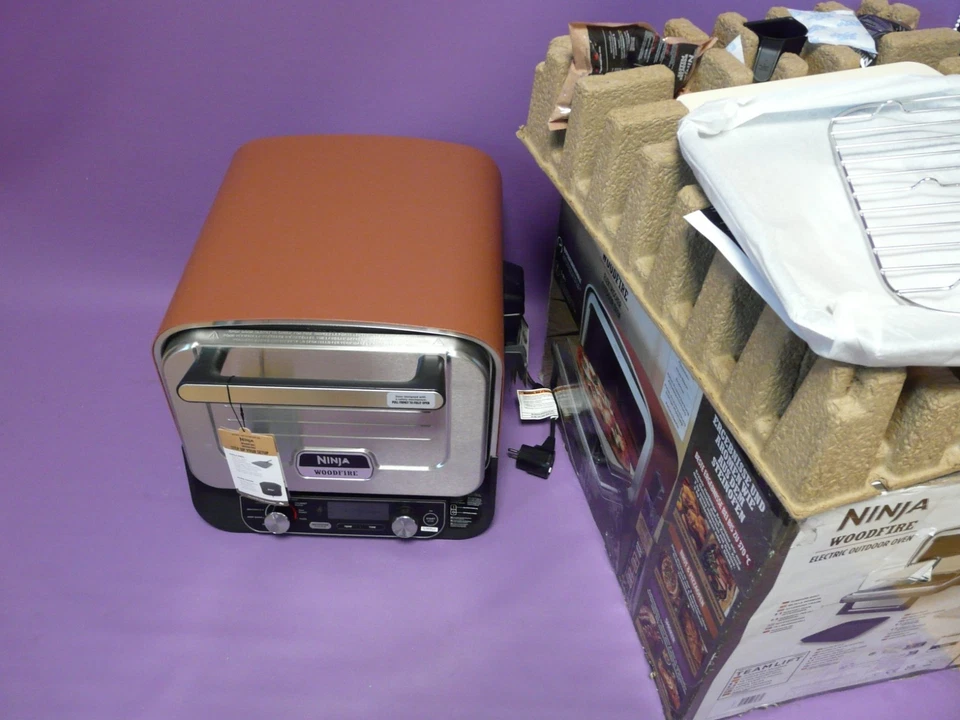 Ninja Woodfire OO101EU Outdoor-Ofen, 8-in-1-Pizza- Ofen, BBQ-Smoker mit Bratrost