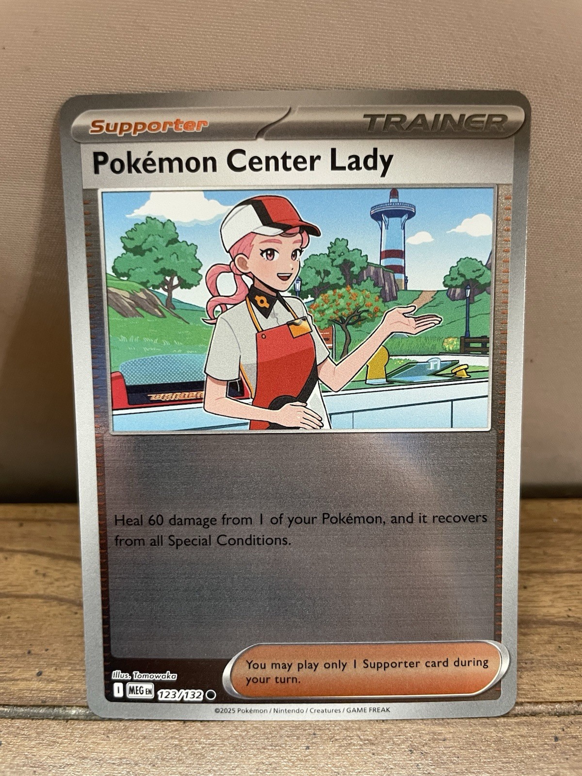 Pokemon Center Lady 123/132 Me01: Mega Evolution Reverse Holo