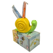 AVON VINTAGE 1970S SMILE‐N‐SNAIL UCHWYT SZCZOTECZKI DO ZĘBÓW + 2 SZCZOTECZKI DO ZĘBÓW – STALÓWKA / NOS