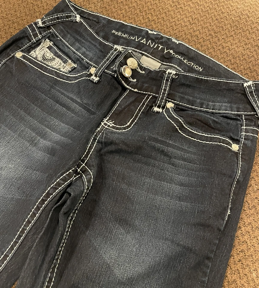 Jeans de mezclilla de ajuste curvilíneo de lavado oscuro de la colección Premium Vanity 25W/33L Foto 3 de 4