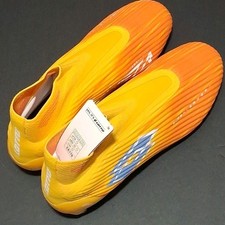 Lotto Unisex M-9.5 W-10.5 Solista 100 Gravity IX FG Soccer Cleats, Orange/Blue