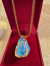 Raw Unpolished light blue gemstone, possibly aquamarine