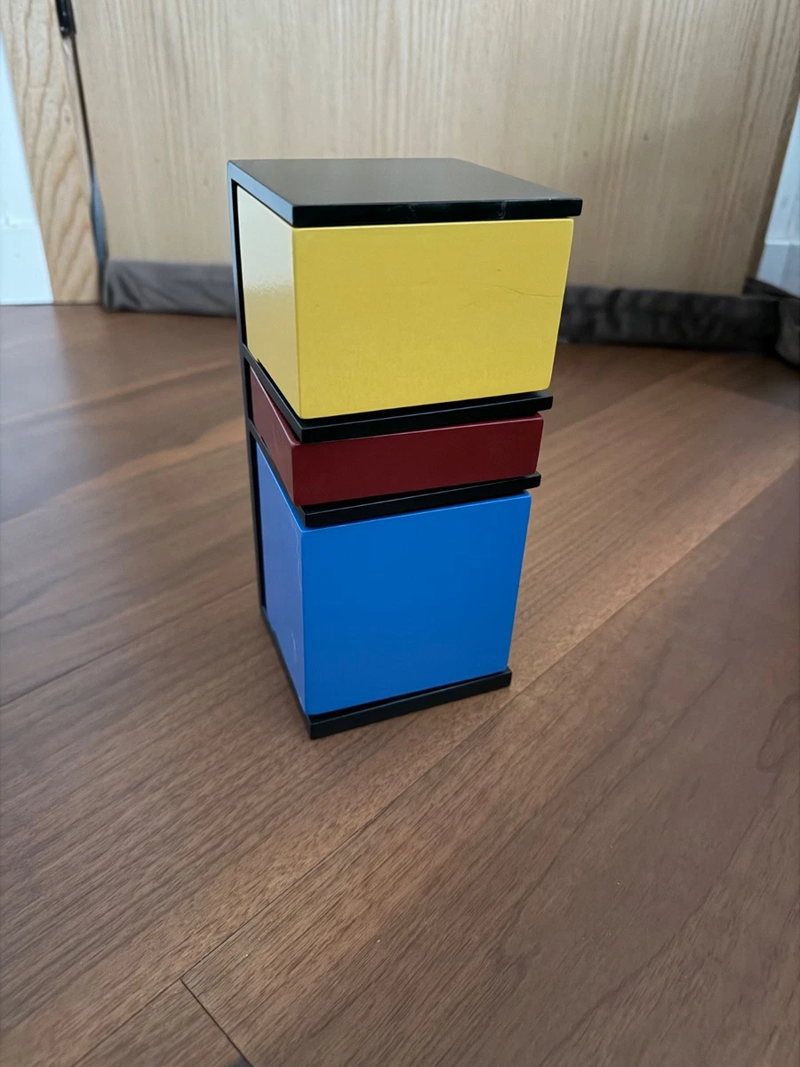 Wooden storage tower titled 'De Stijl Storage Tower' by MoMA