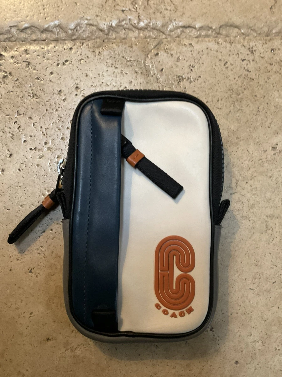 Hybrid pouch with signature canvas blocking sale