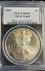 2001 $1 American SILVER Eagle PCGS MS69 GOLD toning starting on top SEE PICTURES