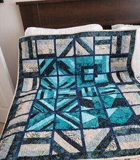 Hand made-Totally Scrappy, blue, green and tans, small  lap or crib quilt 42x37"